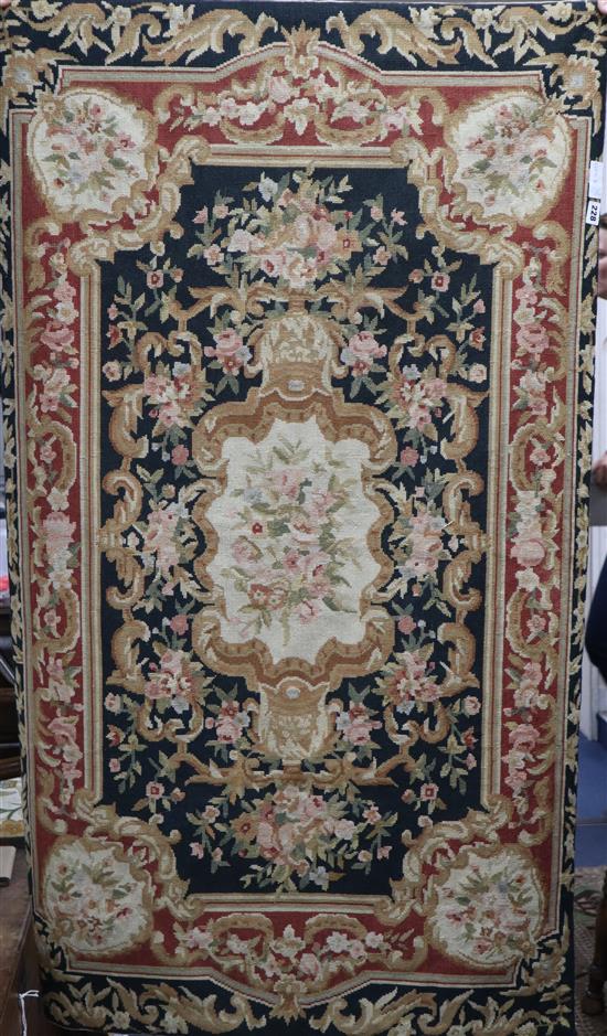 An Aubusson-style tapestry panel and a table cover
